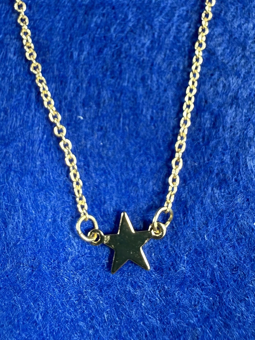 Marina De Buchi Shine Bright Gold Star necklace.